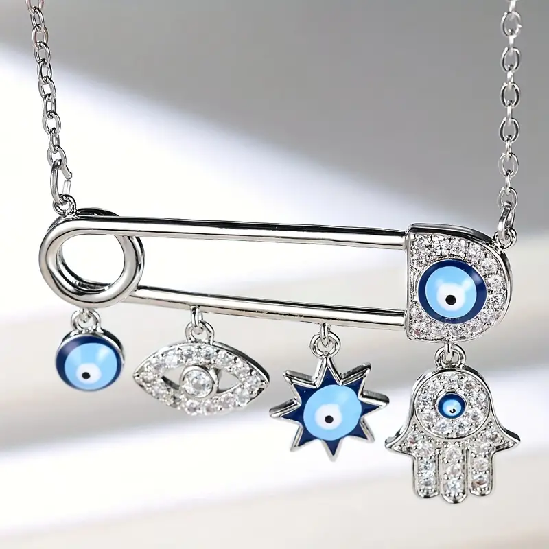 Gémkapocs alakú ezüstszínű Evil Eye és Hamsa Hand charm nyaklánc 9 Gémkapocs alakú ezüstszínű Evil Eye és Hamsa Hand charm nyaklánc