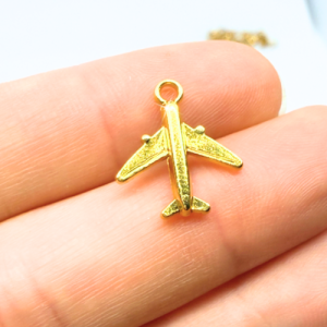 Repülő aranyszínű charm